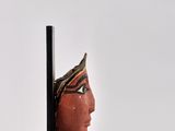 an image of a sculpture of a woman ' s head on a black stand
