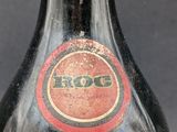a close up of a bottle of beer on a table