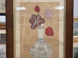 une photo d'une photo d'un vase contenant des fleurs