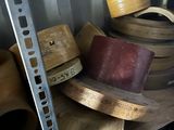 many different types of wooden bowls on the shelves