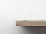 an open box of pizza sitting on top of a white table