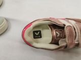 a close up of a pair of shoes on a table