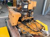 a yellow machine that is sitting on a table