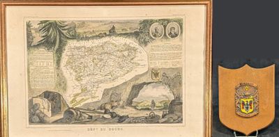 a framed picture of a map and a coat of arms