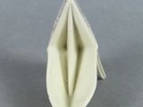 a small white object that is sitting on a table