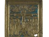 an image of a gold plate with a picture of a group of people on it