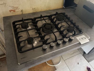 a stove top that is sitting on a counter