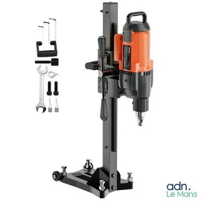 a close up of a drill on a stand with tools