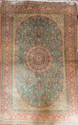an oriental rug on a wooden floor in a room