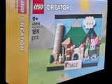 une boîte contenant un kit Lego Creator, posée sur une table