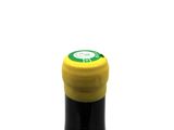 a bottle of wine that is sitting on a table