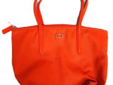 sac fourre-tout en cuir orange de la marque Coach