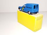 a blue toy truck sitting on top of a yellow box