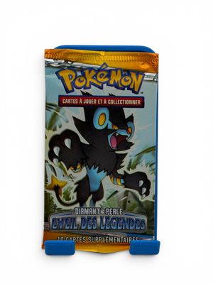 the pokemon trading card game has a blue case with a picture of a black cat on it