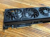 a close up of a video card sitting on top of a wooden table