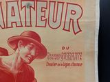 poster of a man in a hat holding a guitar in front of a window