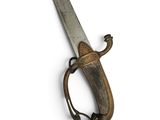 an image of a very old looking knife on a white background