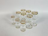 a lot of wine glasses that are sitting on the table