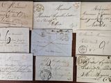 many old letters and envelopes on the table