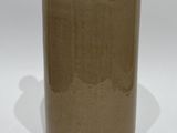 a brown vase with a blue ball on top of it