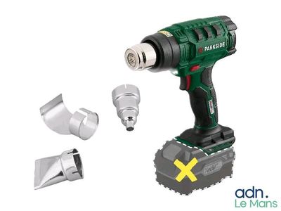 a close up of a cordless drill with a hammer and other tools