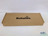 a brown box with a black logo on it sitting on a white surface