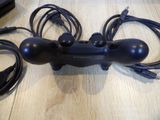 a video game controller that is sitting on a table