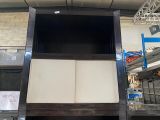 an image of a tv that is in the middle of a room