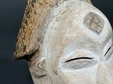 a close up of a sculpture of a person ' s face