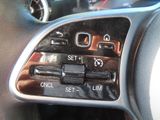 a close up of a car ' s dashboard with buttons