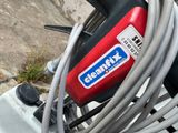 a close up of a cable connected to a motorbike