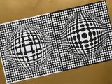 a black and white drawing of two circles with a black and white pattern