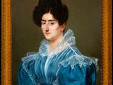 portrait of a woman in a blue dress by a gold frame