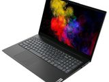the laptop is open on a white surface with colorful paint on the screen