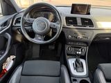 the interior of a car with a steering wheel and dashboard controls