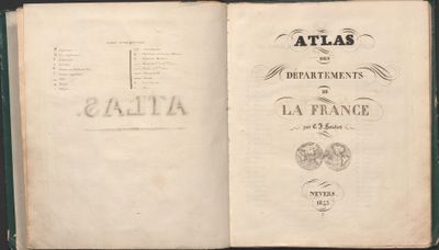 an open book with a picture of a map on it