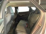 a car that has two seats in the back of it