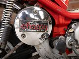 a close up of a red motorcycle with the word chappy on it