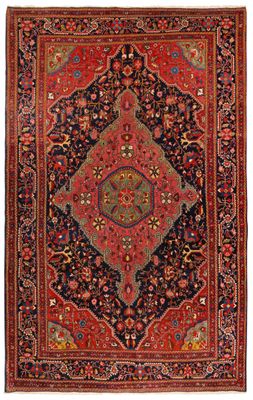 un tapis persan ancien aux couleurs rouge et noir