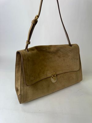 an image of a brown handbag on a white background