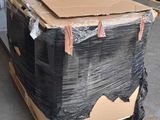 a large cardboard box on a pallet in a warehouse