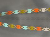 an image of a multi colored necklace with a gold clasp