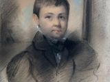 portrait of a young boy in a black suit and bow tie