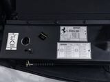 an image of a car ' s engine compartment with the control panel removed