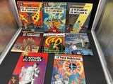 a lot of comics on display in a display case