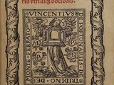un vieux livre sur lequel figure l'image d'un homme tenant une croix