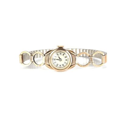 Montre bracelet en or jaune 18K (750/oo) et argent (950/oo),…