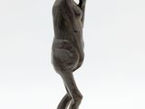 statue of a man with a hat on his head