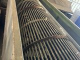 a metal grate in the middle of a building