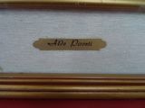 an image of a picture of a gold frame with a name on it